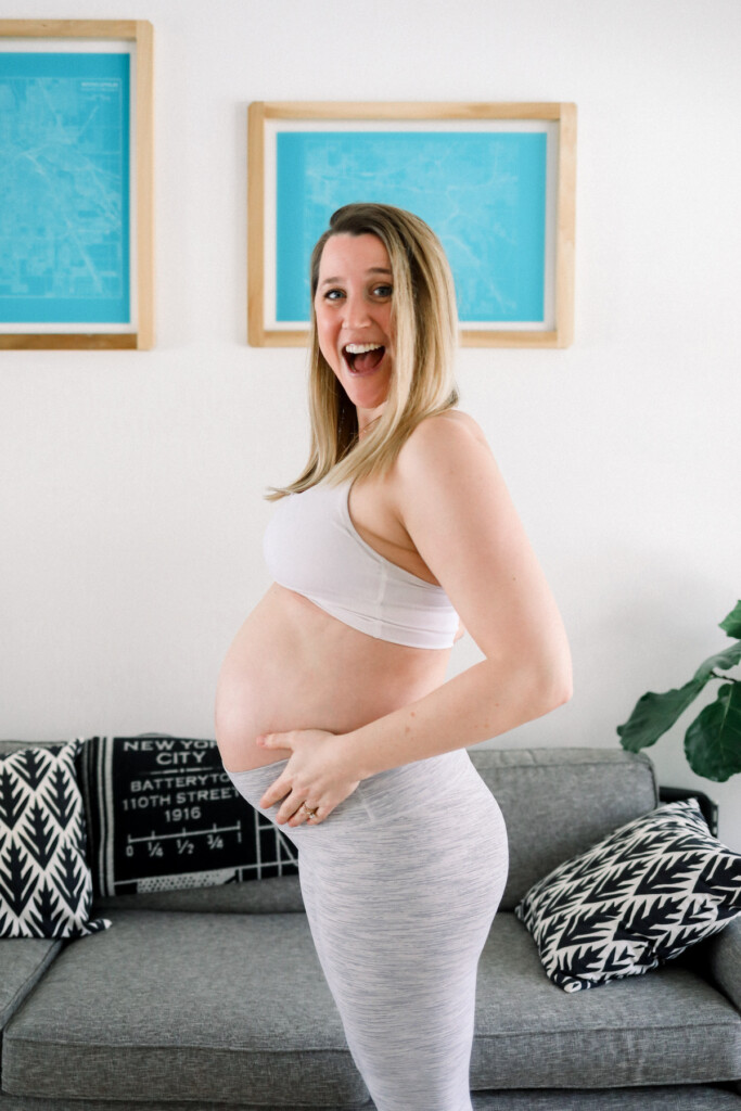 Pregnant woman wearing lululemon gear.