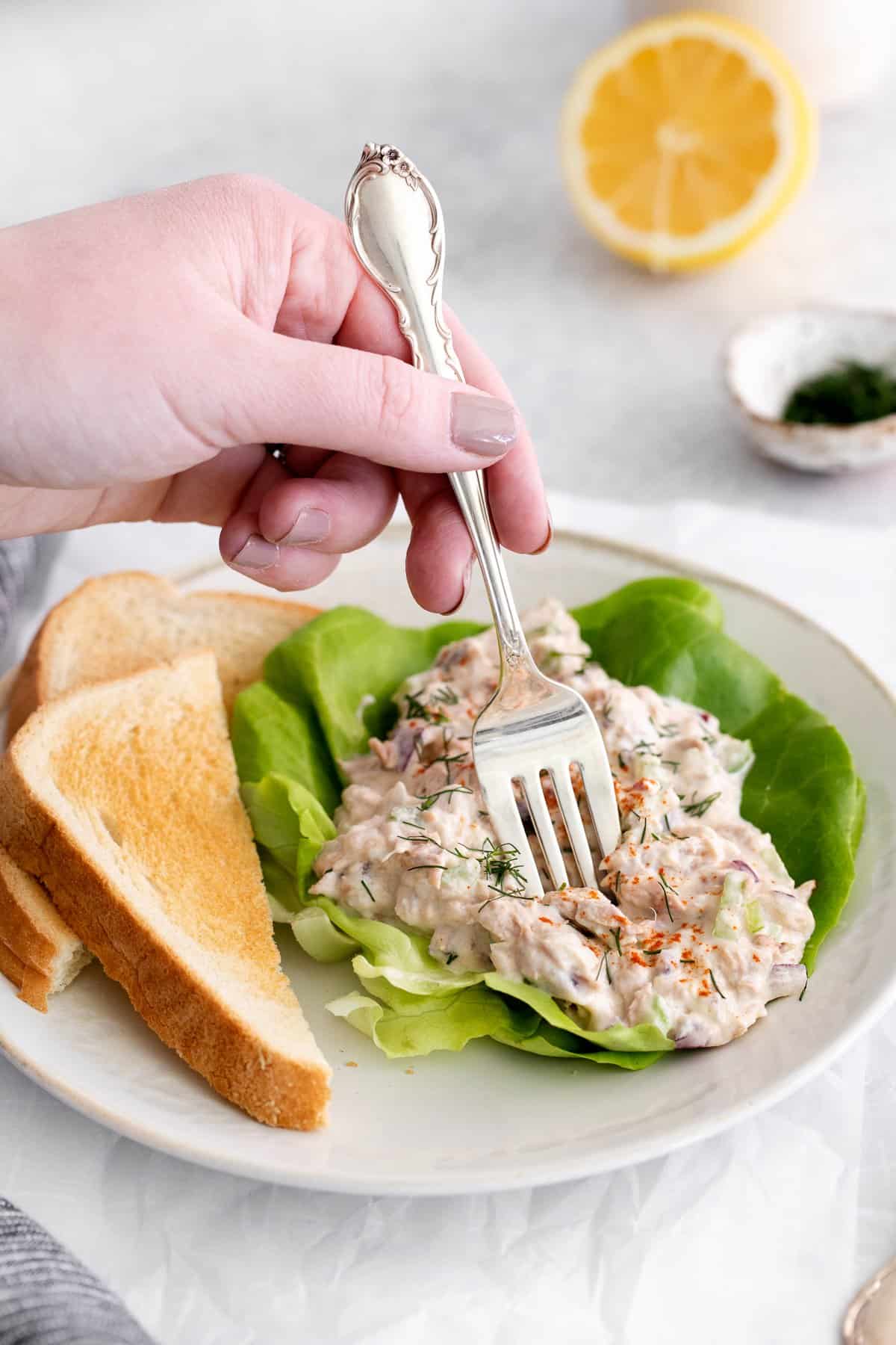 Tuna salad on a fork.