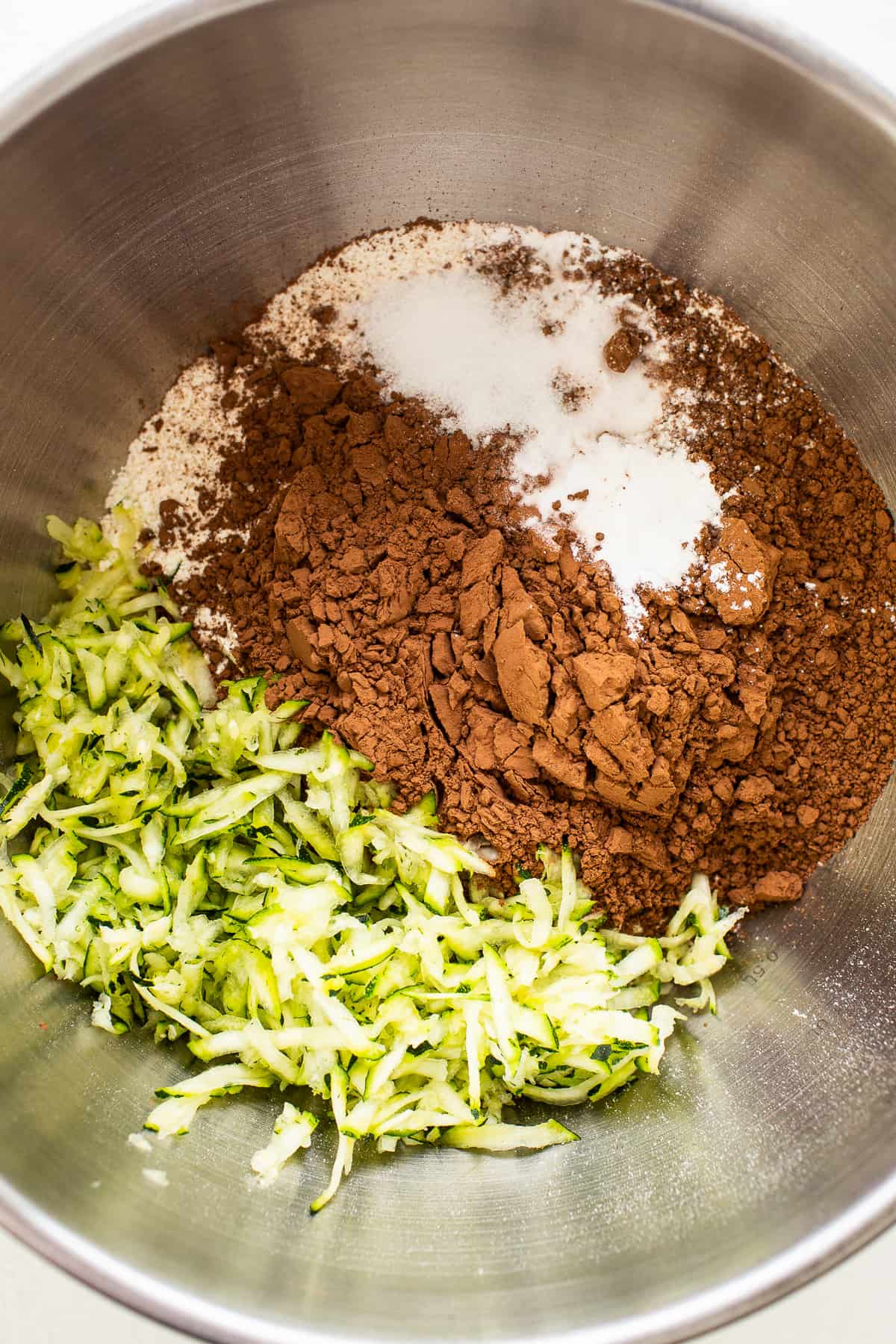 Dry ingredients for chocolate zucchini bread in a bowl.