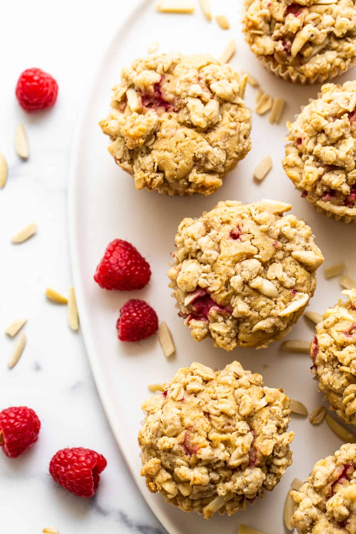 raspberry muffins on plate.