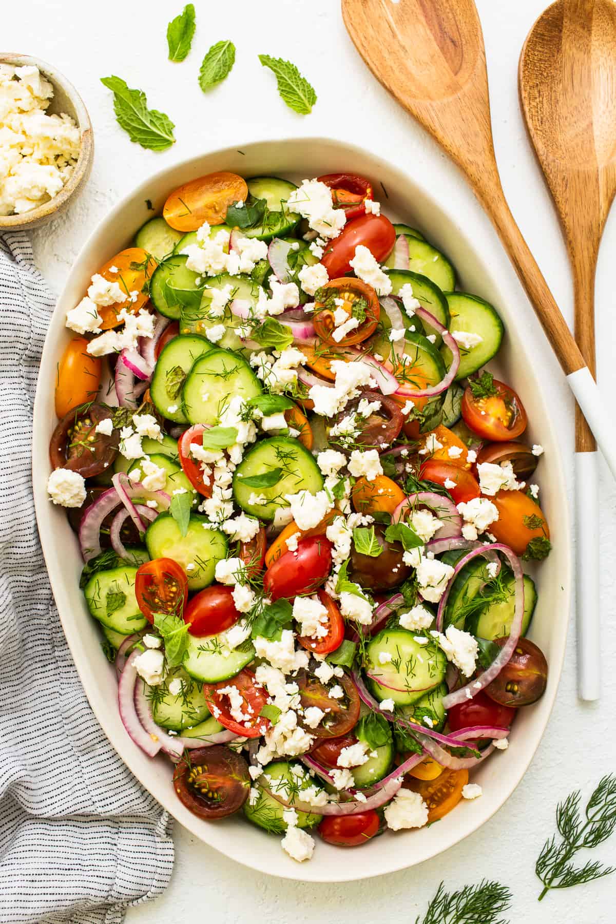 Cucumber Tomato Salad in a serving platter. 