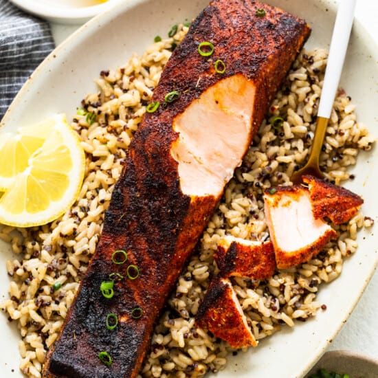 Blackened salmon on a bed of grains.