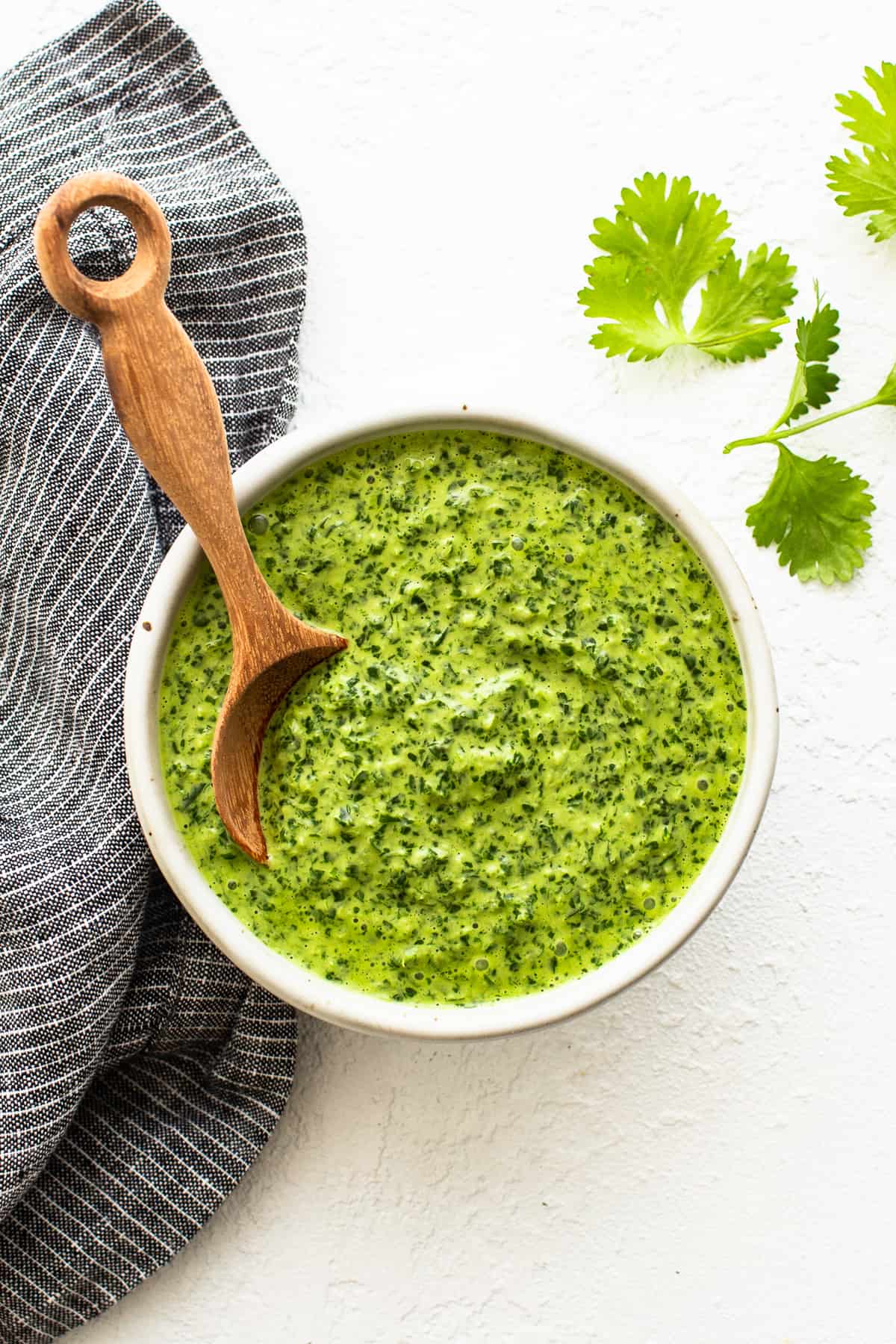 green sauce in bowl with spoon.