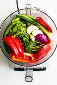 Fresh vegetables in a food processor.