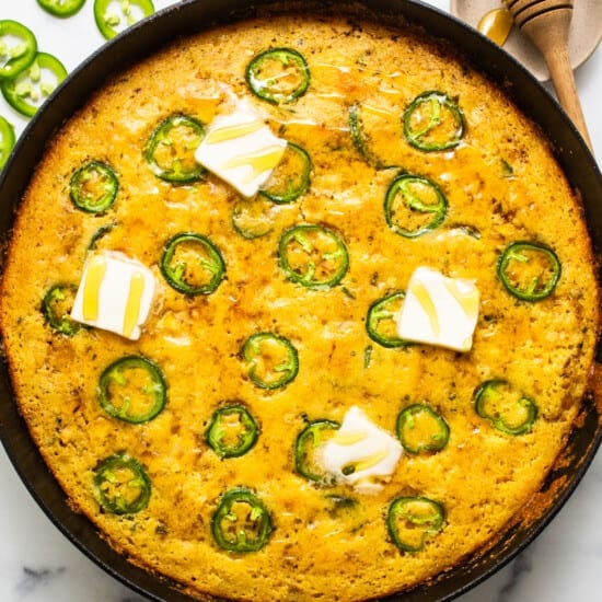 Jalapeno corn pudding in a cast iron skillet.