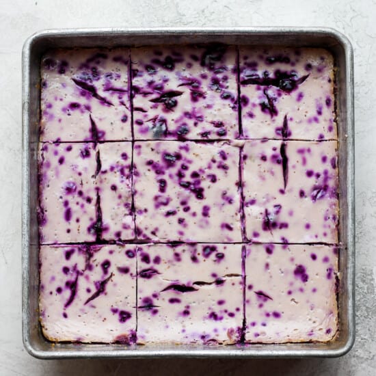 blueberry cheesecake bars in pan.