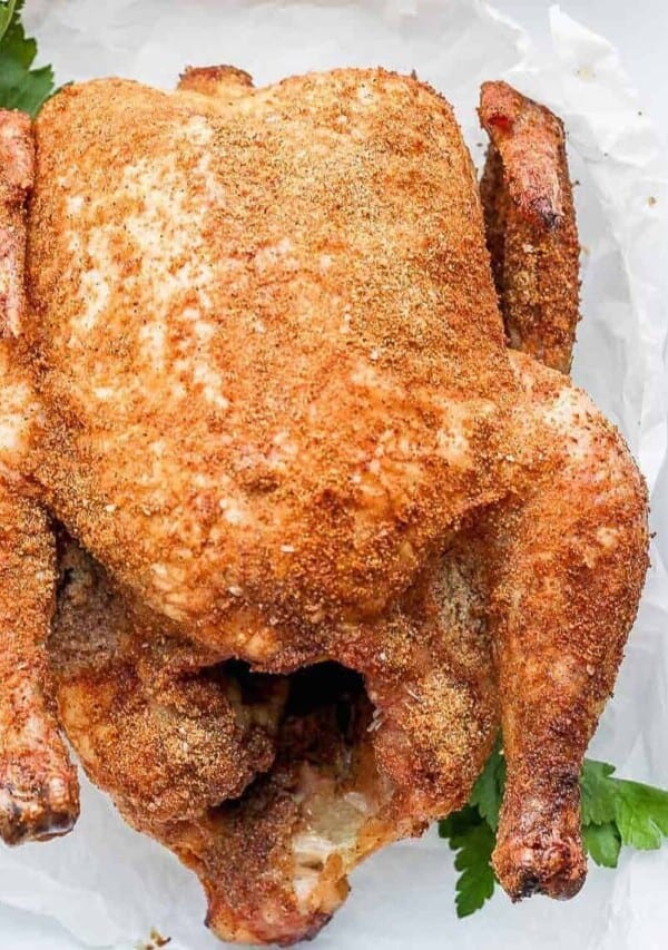 whole chicken in pan.