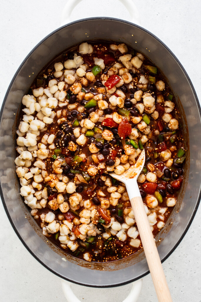 black bean quinoa chili ingredients in Dutch oven.