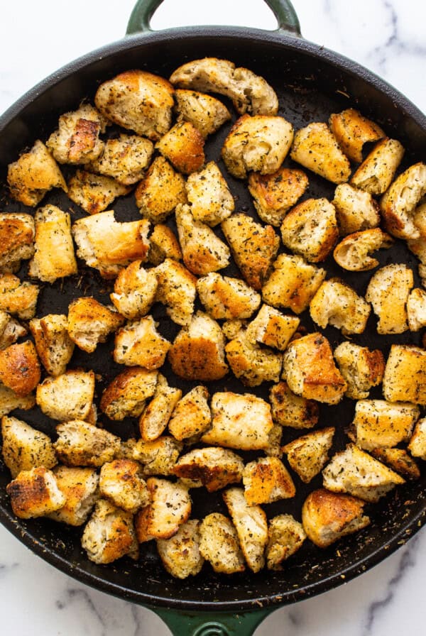croutons in cast iron skillet.