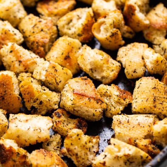 croutons in cast iron pan.