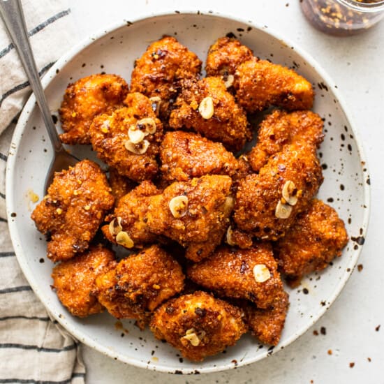 hot honey chicken poppers in bowl.