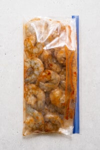 shrimp in bag with marinade.