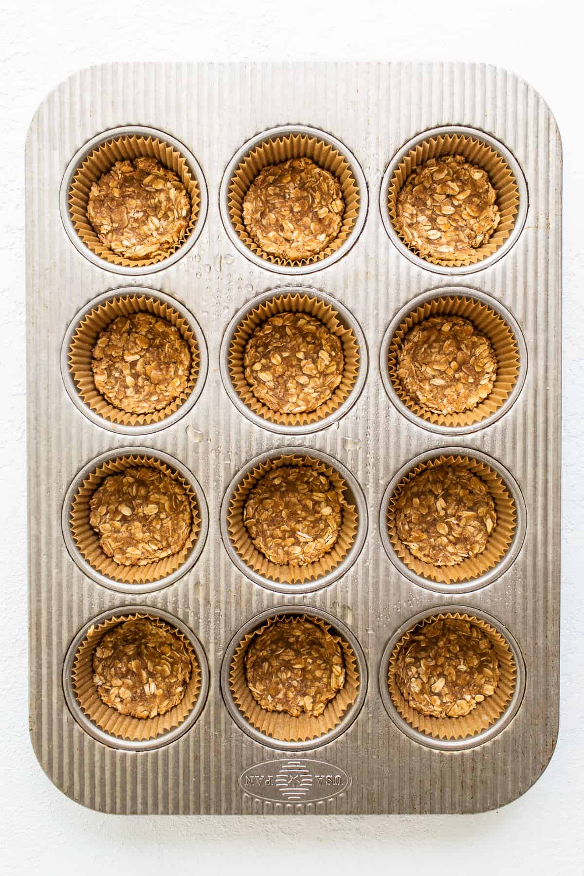 crisp topping in muffin tin.