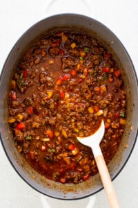 Texas chili simmering in a pot.