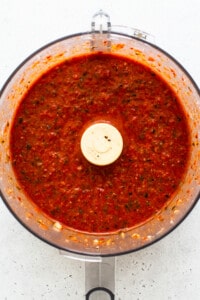 Red pepper sauce in a food processor.