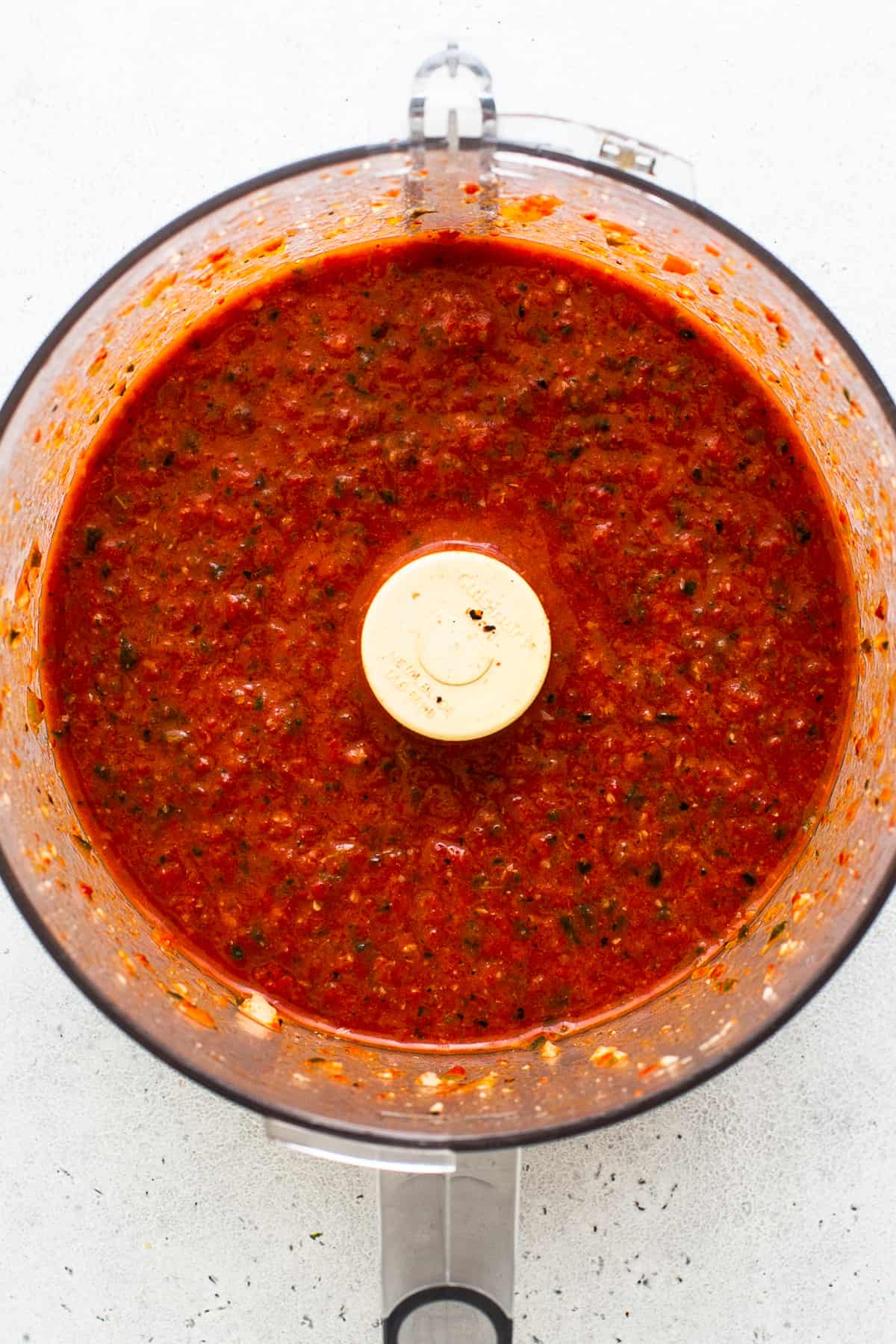 Roasted red pepper sauce in a food processor. 