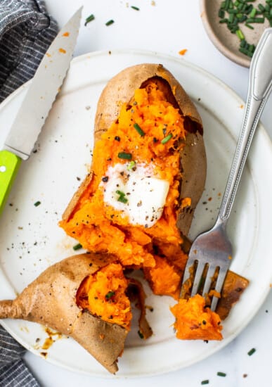 Keywords used: baked sweet potato recipe

Description: A delicious baked sweet potato recipe, featuring tender sweet potatoes served on a plate with a fork.