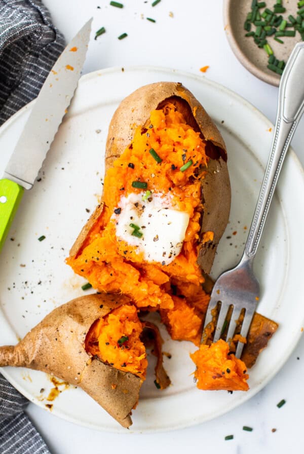 Keywords used: baked sweet potato recipe

Description: A delicious baked sweet potato recipe, featuring tender sweet potatoes served on a plate with a fork.