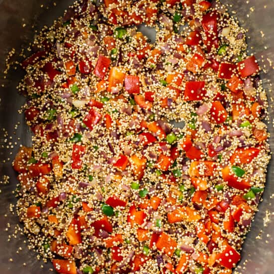 cooking quinoa chili in dutch oven.