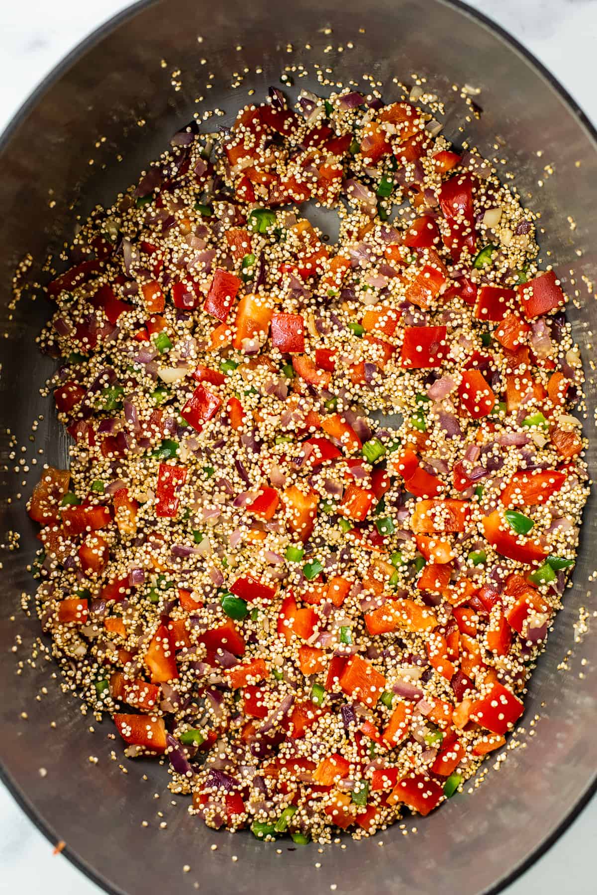 cooking quinoa chili in Dutch oven.