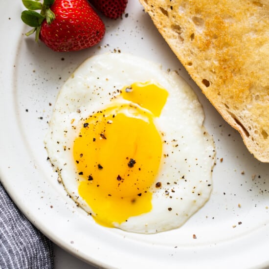 Over Easy Eggs (step-by-step!) - Fit Foodie Finds