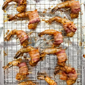 Bacon wrapped shrimp on skewers.