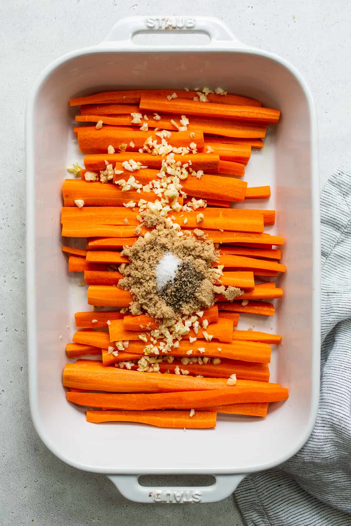 Garlic glazed carrots in a casserole dish.