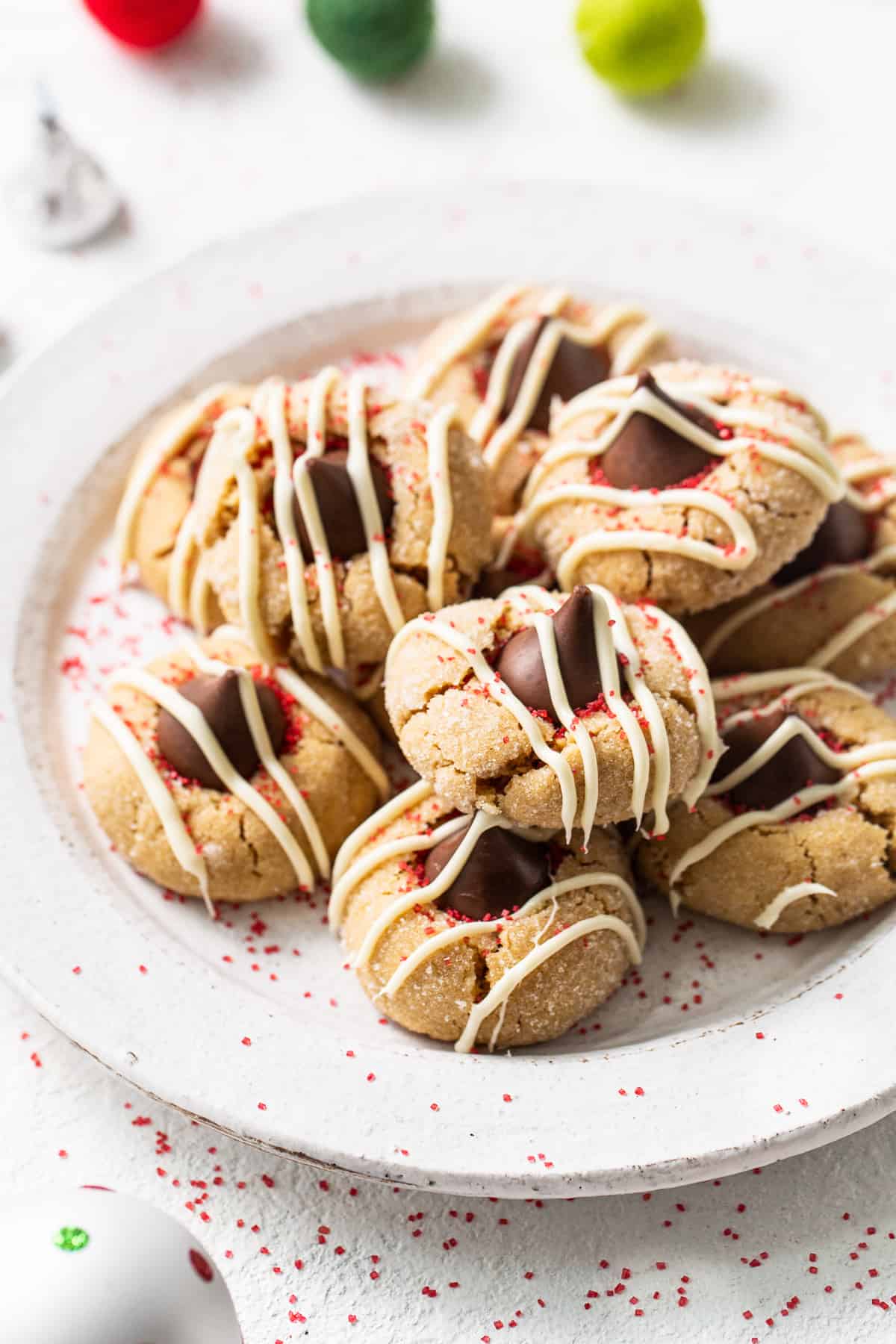 Peanut butter kiss cookies on a plate.