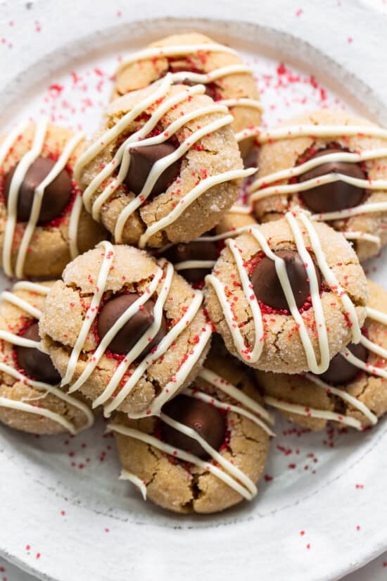 Peanut butter kiss cookies on a plate.