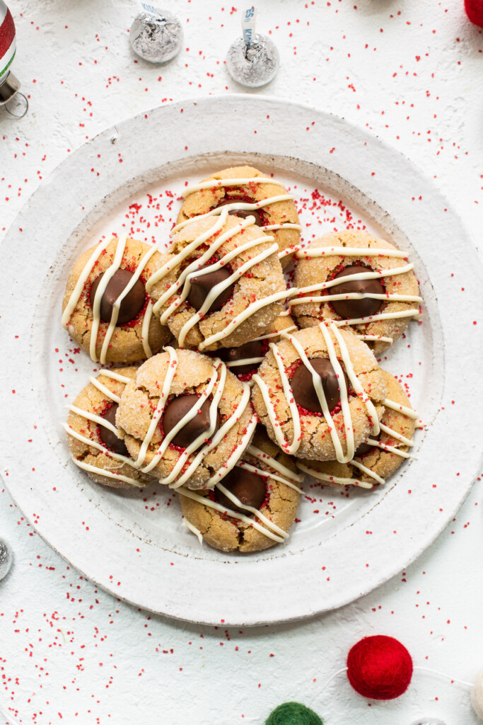 Peanut butter kiss cookies on a plate.