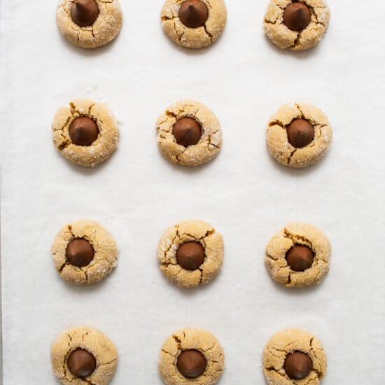 Peanut butter cookies on a baking sheet.