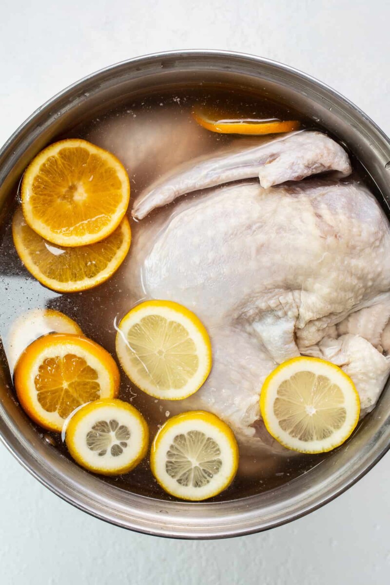A whole turkey sitting in a brine. 