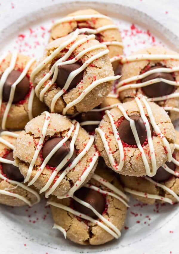 Peanut butter kiss cookies on a plate.