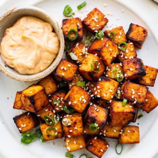 Air fryer tofu on a plate.