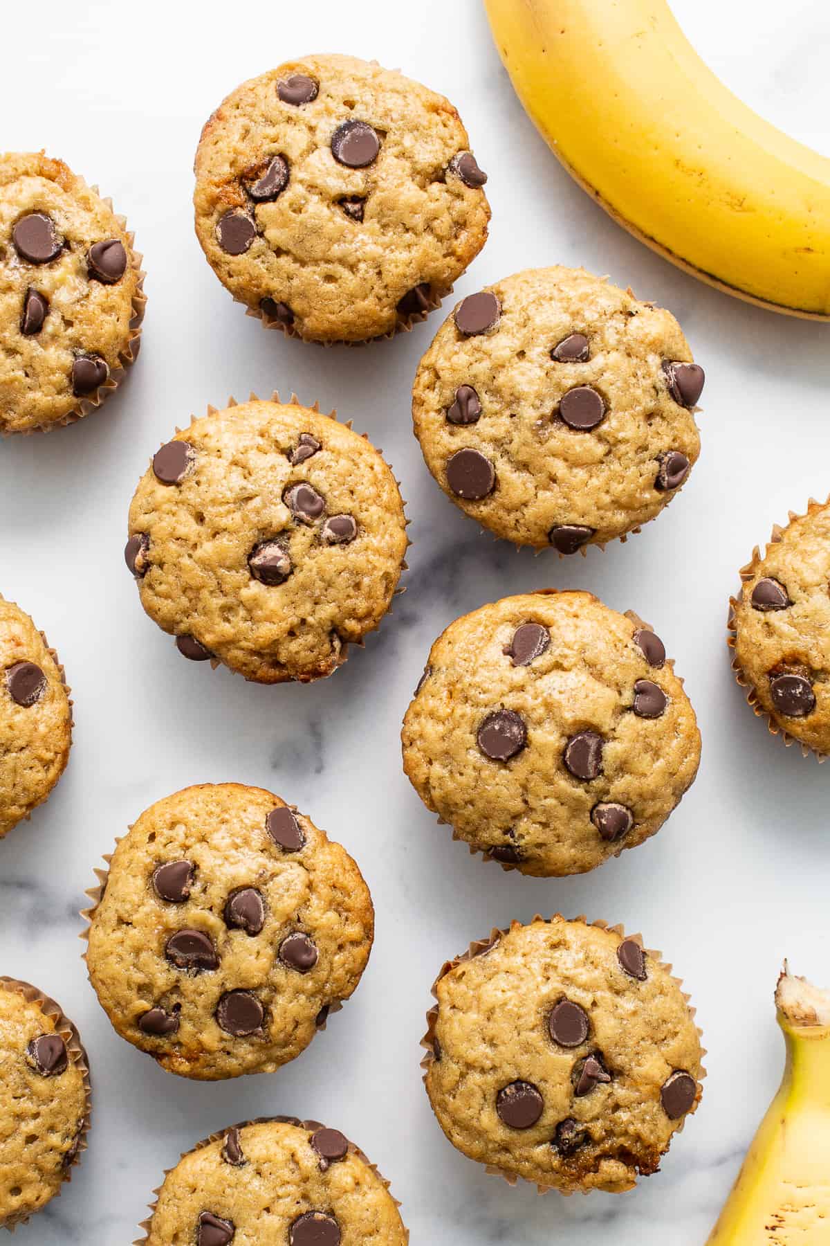 Banana bread muffins on a table.