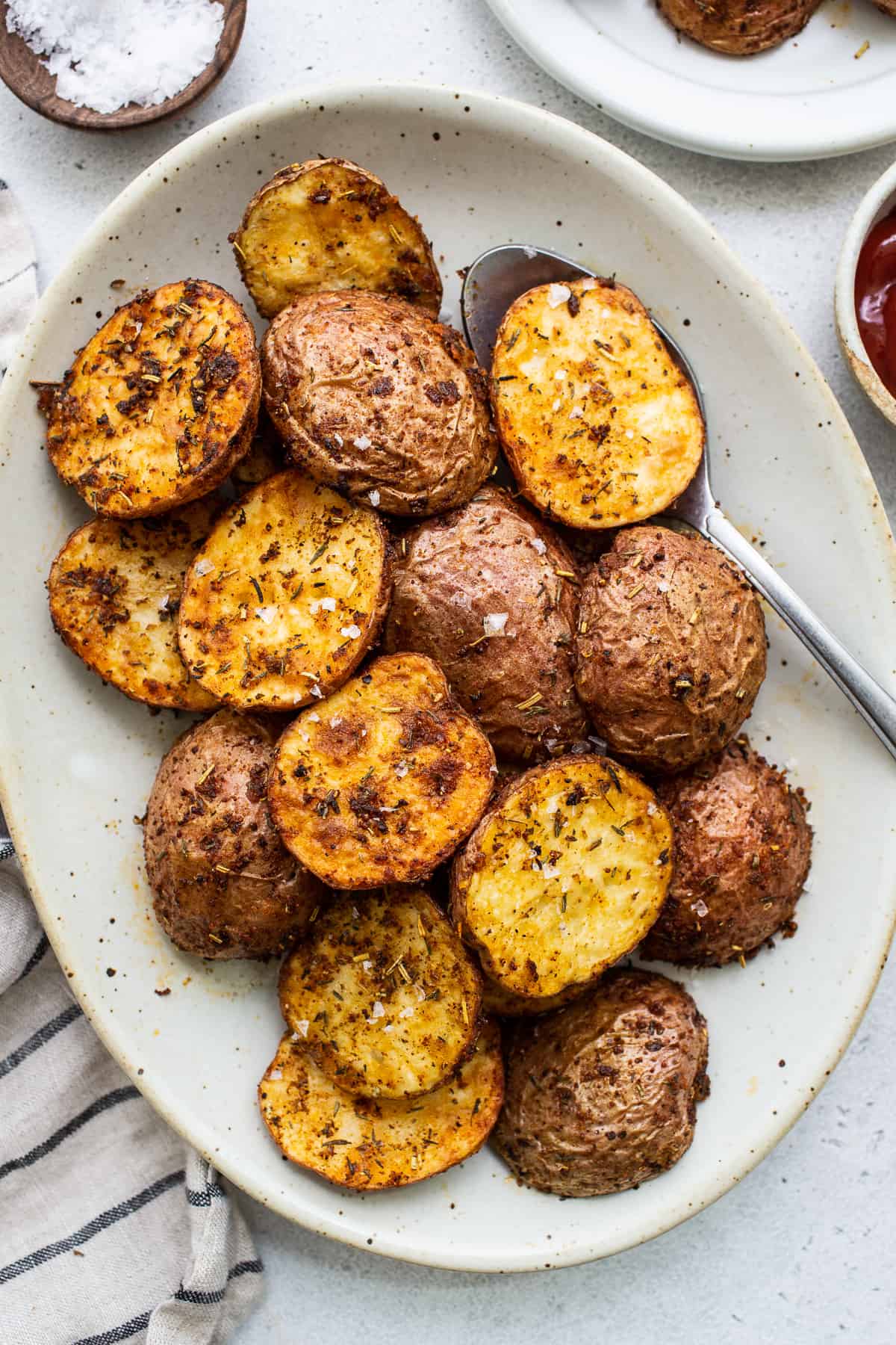 Crispy air fryer potatoes on a plate.