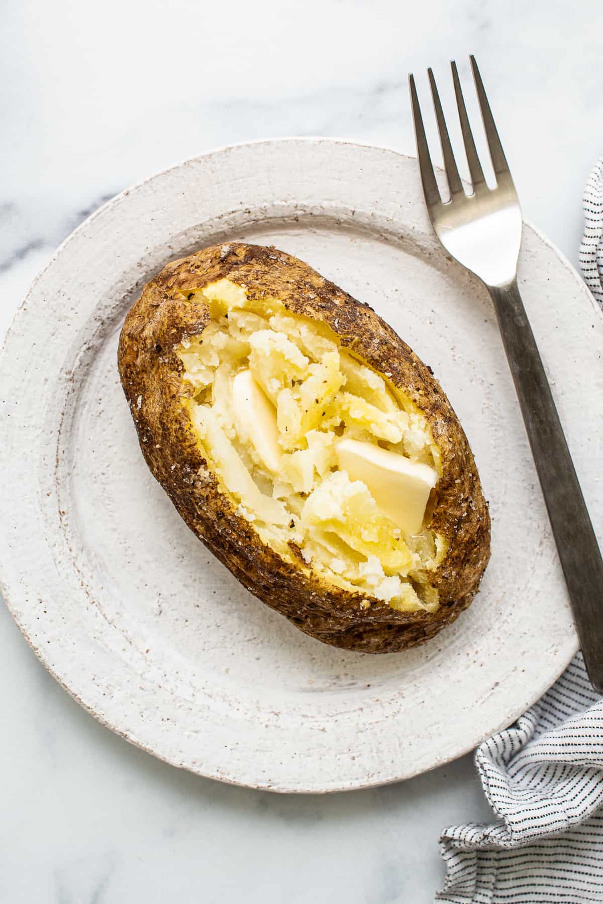 A potato with butter in the center. 