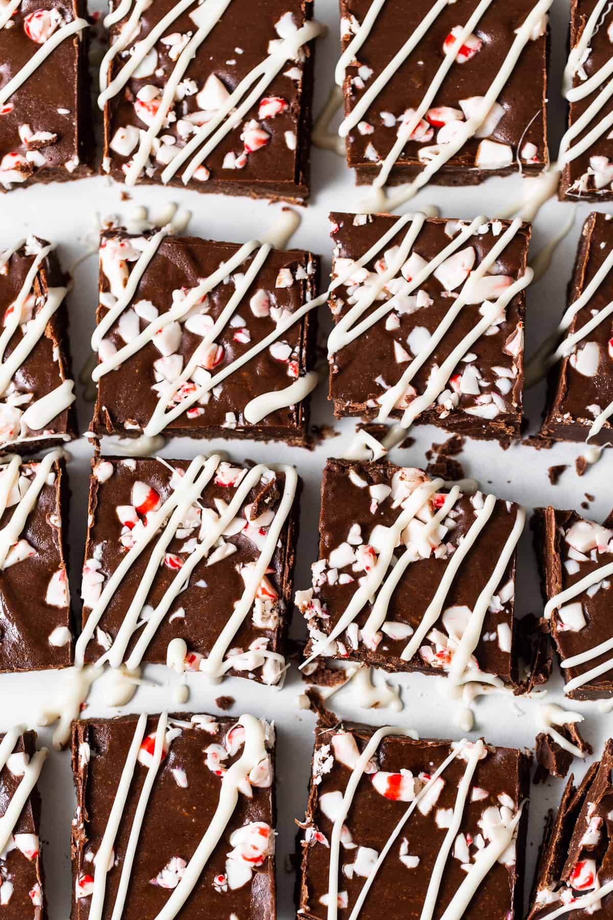 Freezer fudge pieces with white chocolate and peppermint on top. 