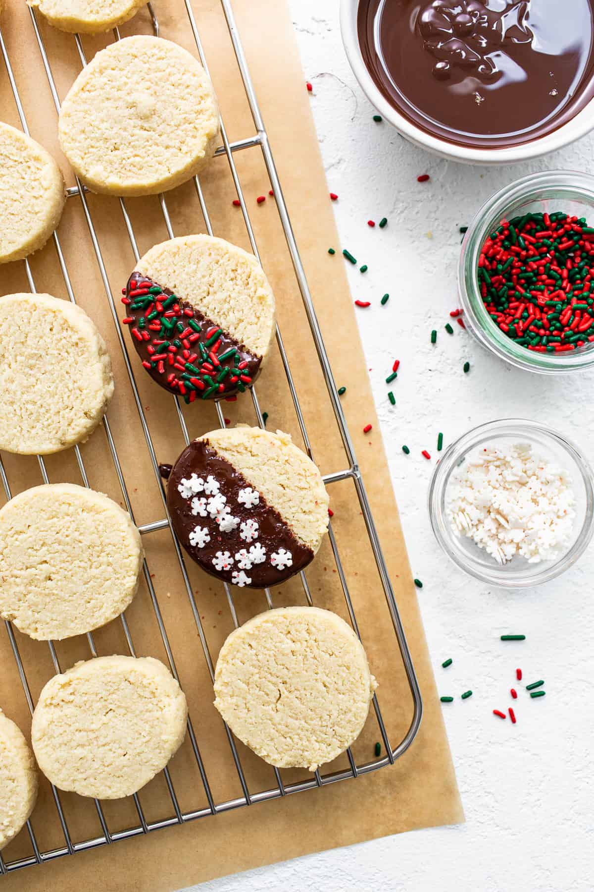 Cookies on a cooling rack with sprinkles. 