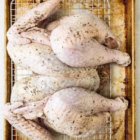 Roasted turkey on a baking sheet.