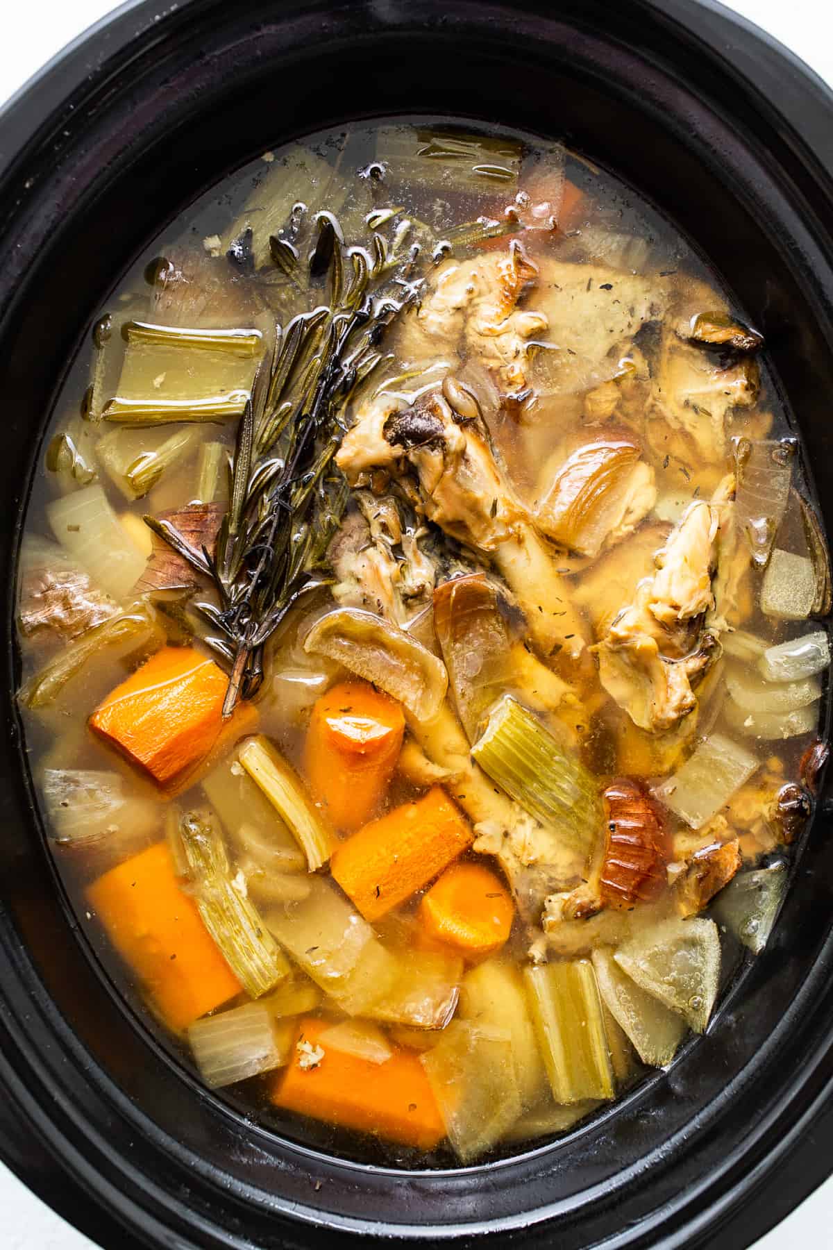 Turkey stock in the slow cooker. 