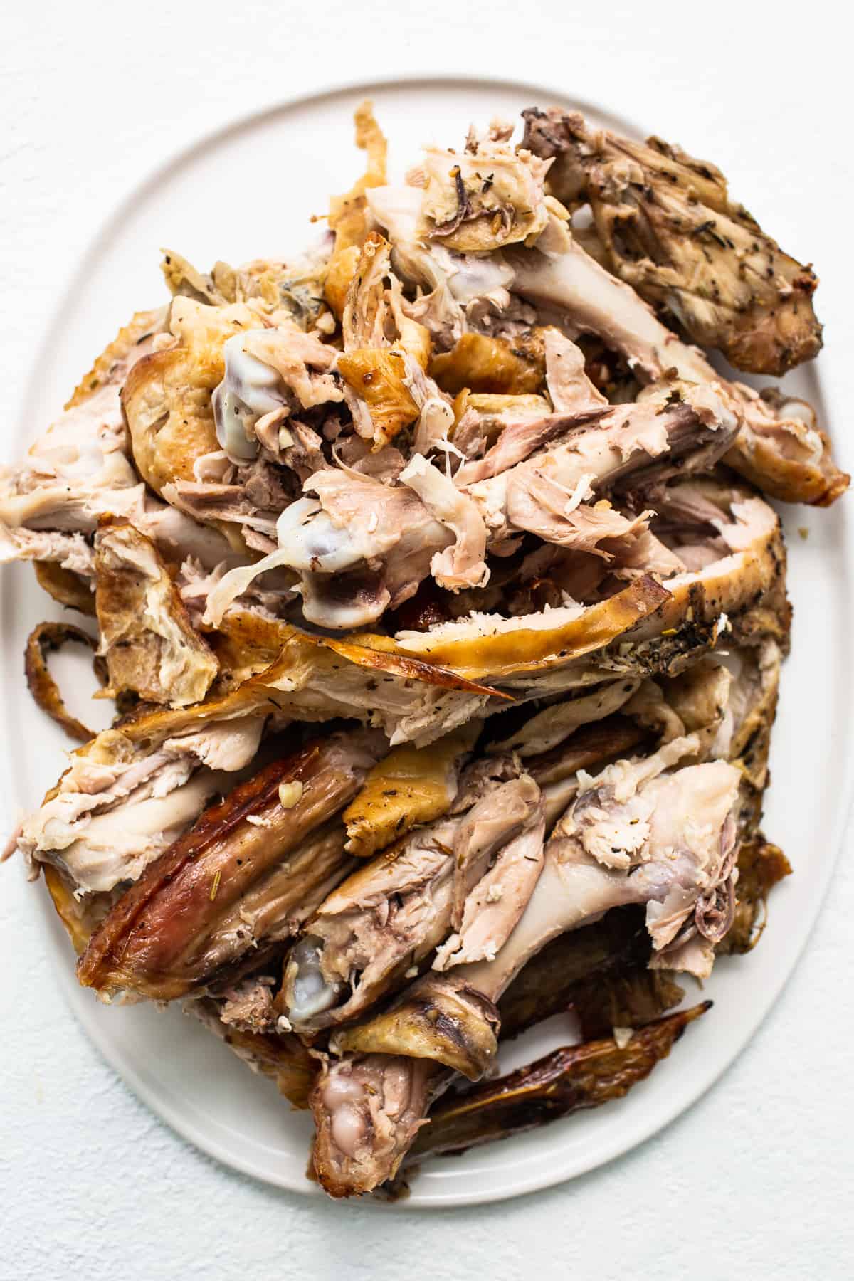 A turkey carcass on a plate. 