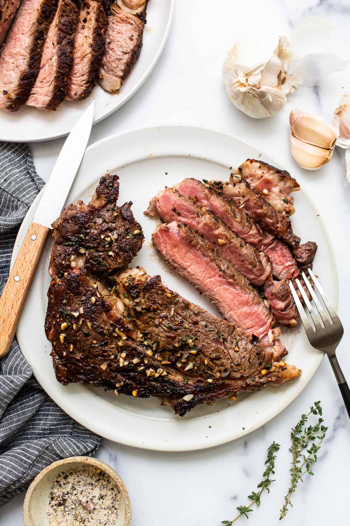 Sliced cast iron steak on a plate. 