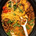 Mexican chicken enchilada soup recipe by a fit foodie finds, cooked in a slow cooker.