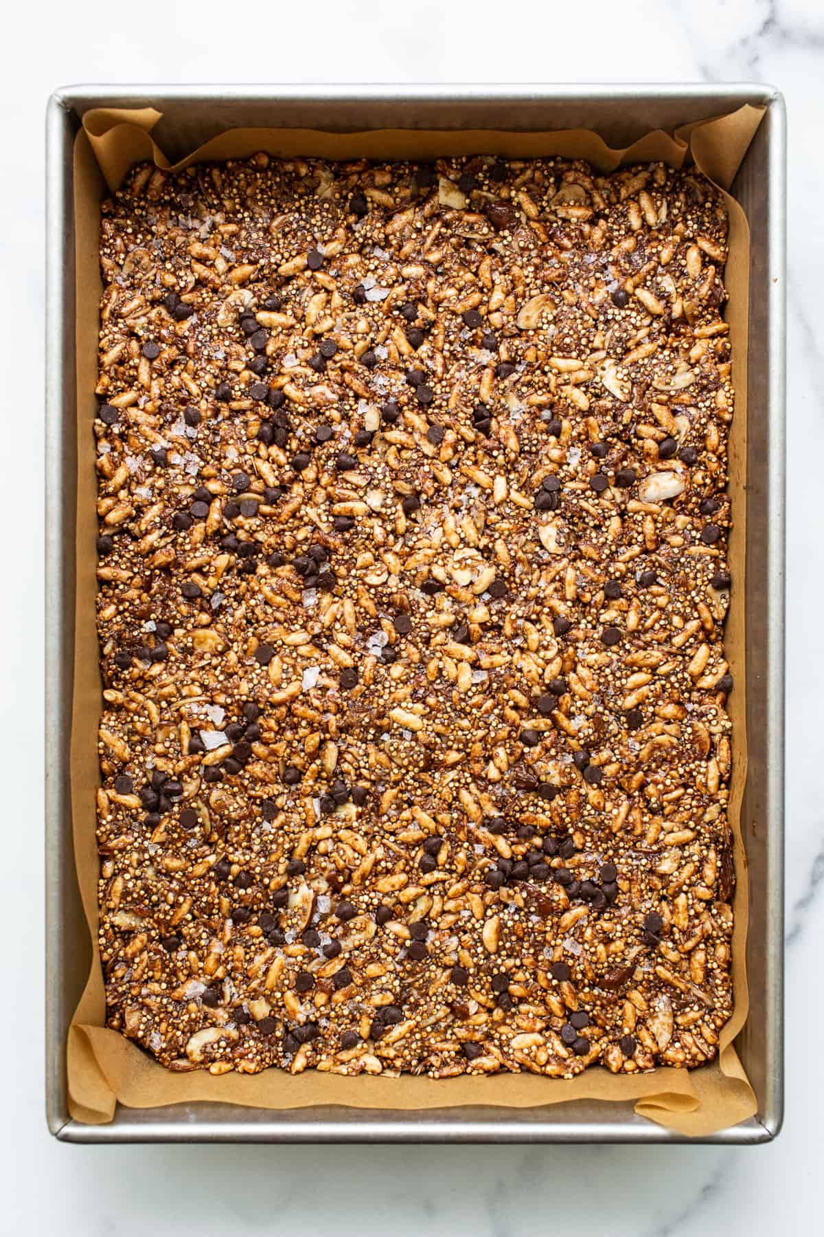Nut and coconut bars in a pan. 