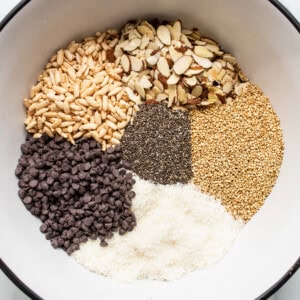 Ingredients in a bowl for nut and coconut bars.