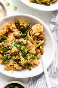 orange chicken casserole in bowl.