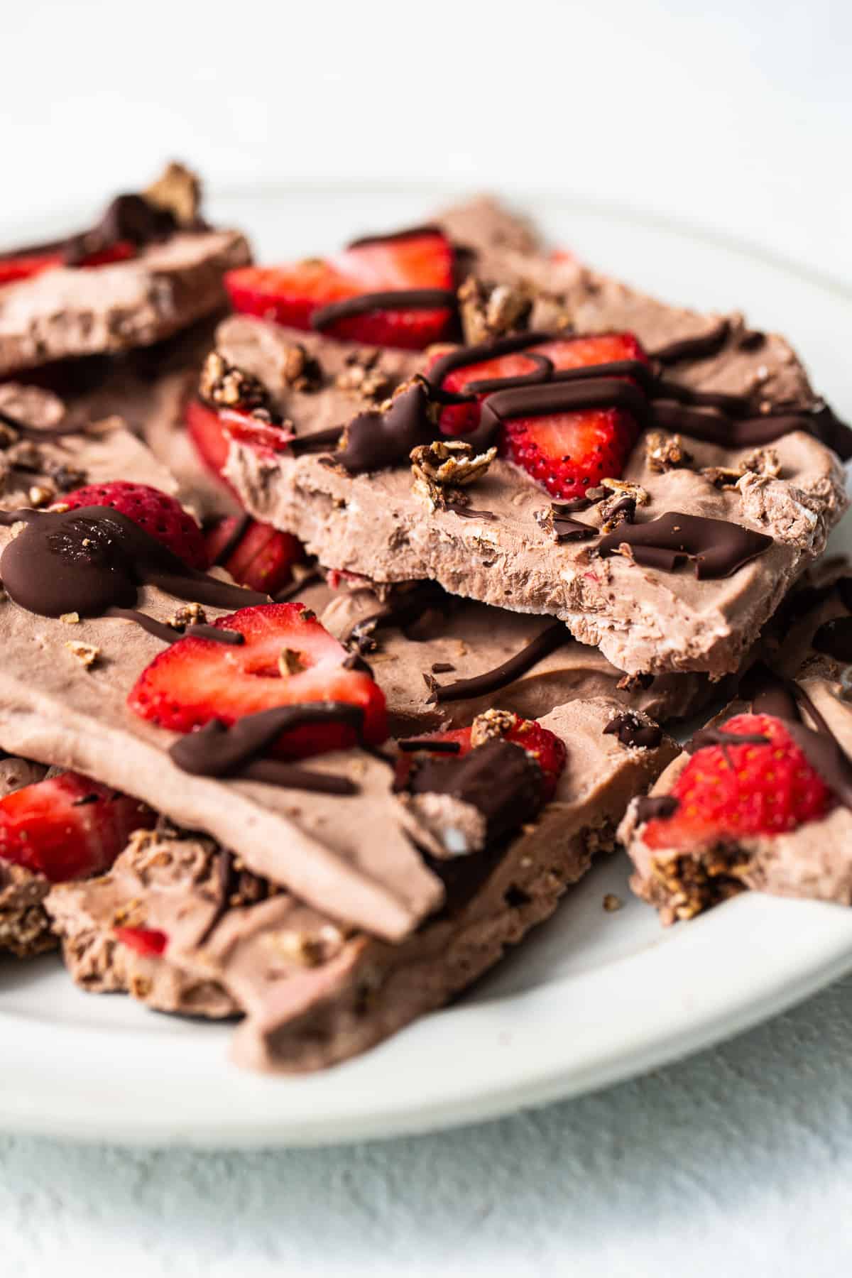 Frozen yogurt bark on a plate.