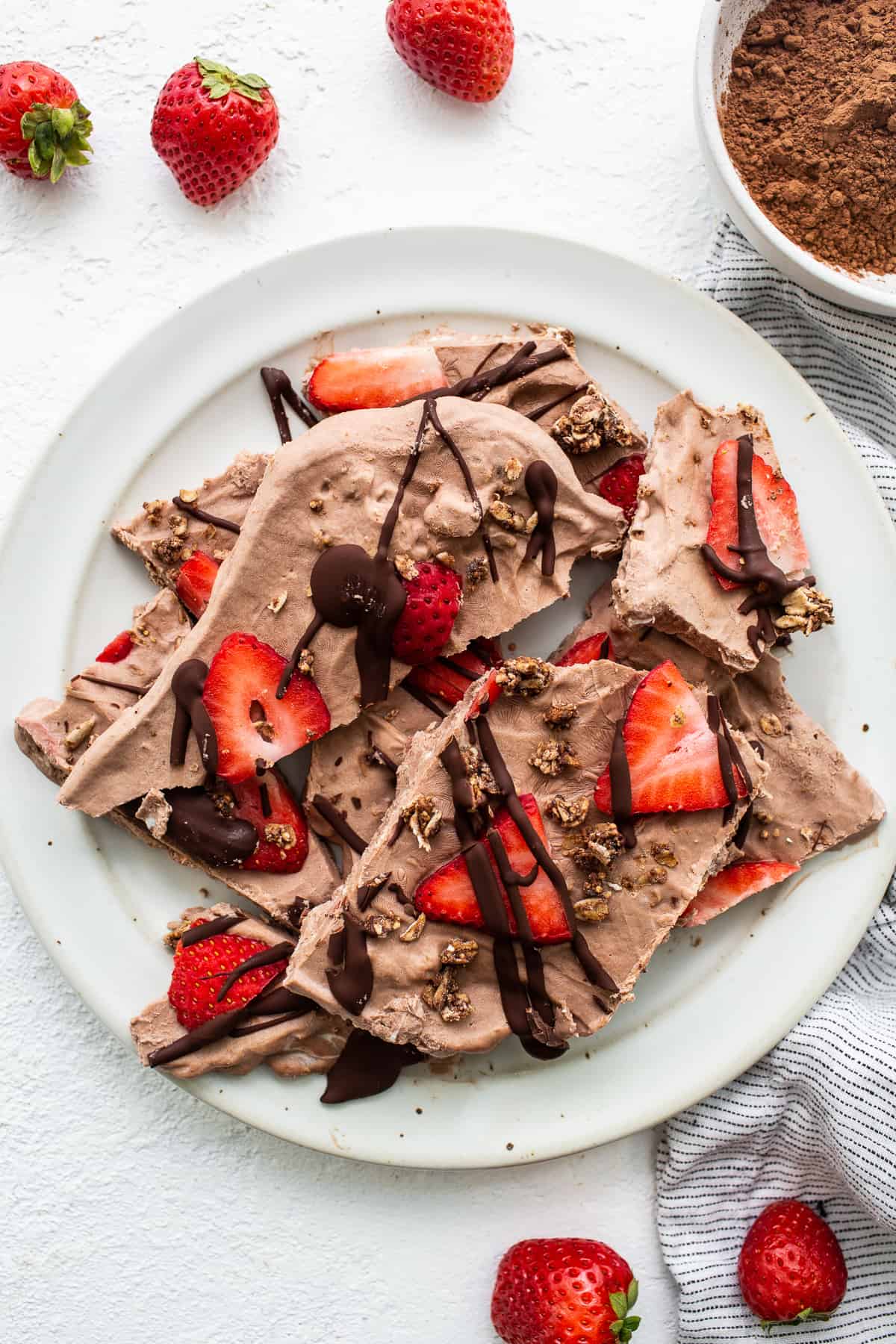 Frozen yogurt bark on a plate.