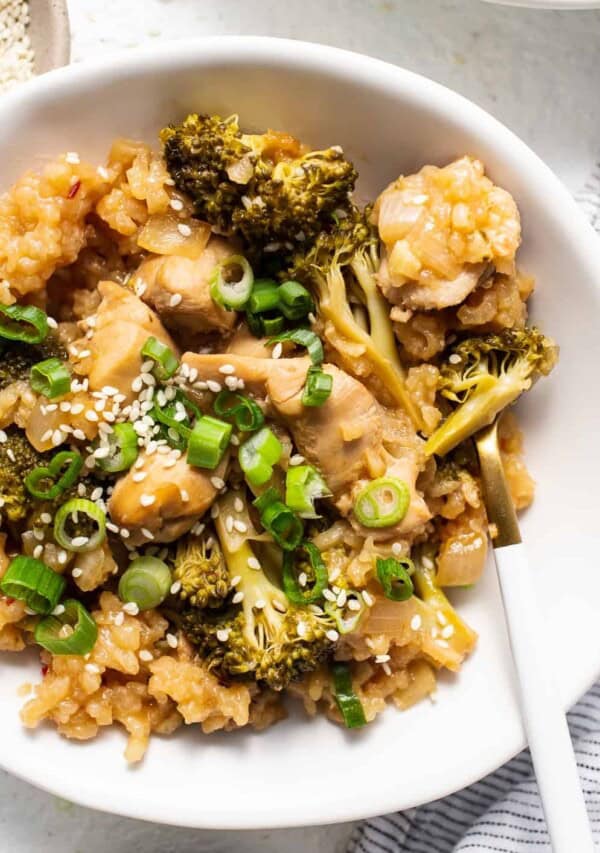 Chicken fried rice with broccoli and sesame seeds.